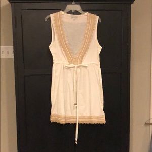 Cream color dress.